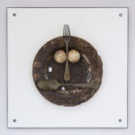 Face2 van 'Faces of Junk'